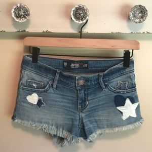HOLLISTER LOW-RISE SHORT-SHORTS, SIZE 23.